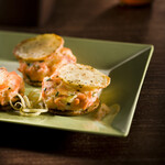 Two Bite Gingery Salmon Potato Burgers on Idaho® Potato Crisps 