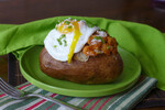 Baked Idaho® Potato with Chorizo, Green Onions, Cotija Cheese and Fried Egg on Top